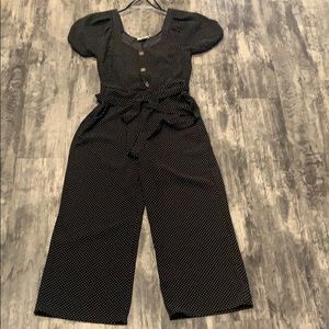 Black and white polka dot jump suit